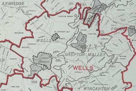 A cream map with parish, rural districts & parliamentary constituencies marked in black, dotted and red.